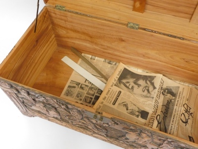 An early 20thC camphorwood chest, with carved oriental figures, central buckle, opening to reveal light out shelf, 59cm high, 105cm wide, 52cm deep. - 4