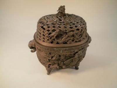 An early 20thC Chinese brass censer with a scaled and serpent cast openwork