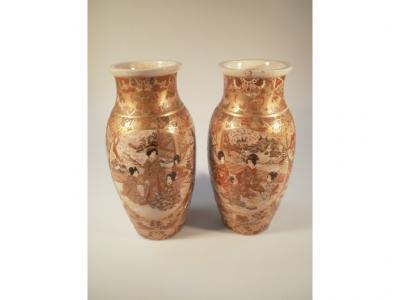 A pair of Japanese Satsuma baluster vases with a symmetrical fan and shaped