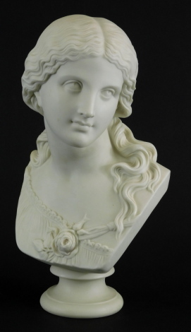 A 19thC Copeland Parian bust of Love, after Raffaele Monti, on an inverted socle, signed and impressed Crystal Palace Art Union, 36cm high.