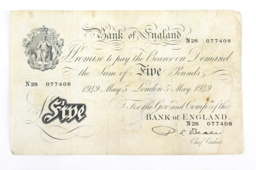 A Bank of England white five pound note, Beale, London 5th May 1949, N28 077408.