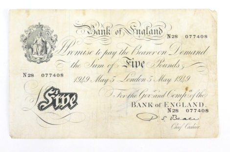 A Bank of England white five pound note, Beale, London 5th May 1949, N28 077408.