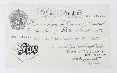 A Bank of England white five pound note, Peppiatt, London November 29th 1944, E76089750.