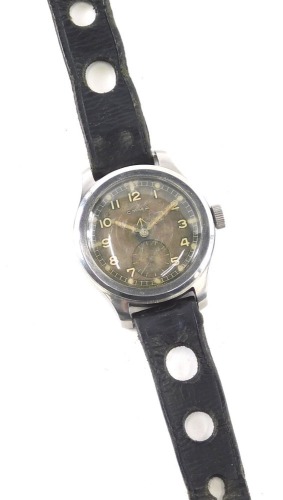 A CYMA gentleman's wristwatch, the 3cm diameter Arabic dial with subsidiary second hand and crow's foot mark, marked verso W.W.W P 7156 12156, with pierced black leather strap.