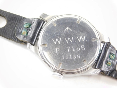 A CYMA gentleman's wristwatch, the 3cm diameter Arabic dial with subsidiary second hand and crow's foot mark, marked verso W.W.W P 7156 12156, with pierced black leather strap. - 3