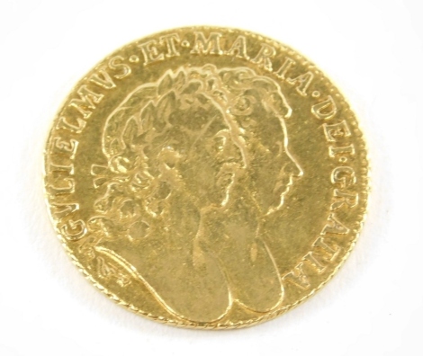 A William and Mary gold full guinea, 1691 shield back.