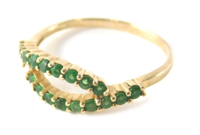 A 9ct gold dress ring, set with two rows of green paste stones, one stone missing, ring size U, 2.3g all in.