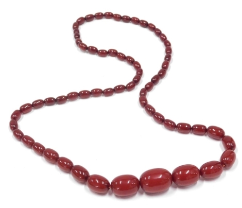 A faux ruby amber finish necklace, with graduated beads, 80cm long.