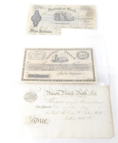 An 18thC Union Bank of Bath one pound note, for Ludlow, Holt and Co., an 1818 Darlington Bank five pound note, M640 and another Gainsbro' Branch ten pound note. (3)