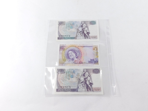 A Bank of England twenty pound note, Page, D39 045113 and two other ...