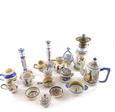 Various Quimper pottery, to include oil lamp, two handled vase, 12cm high, jug, pair of candlesticks, various other jugs, various other items, etc., printed marks beneath. (a quantity)