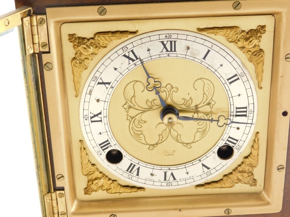 Elliott London. An early 20thC mantel clock, with 10cm diameter Roman