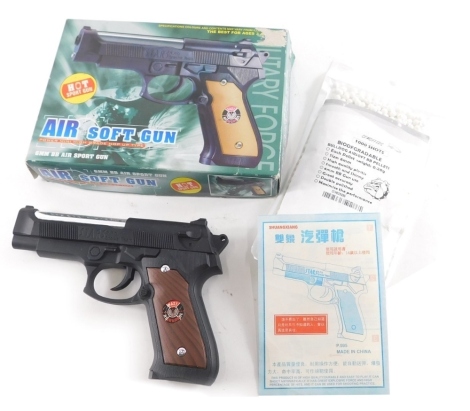 A 6mm BB airsoft gun, partially boxed, 17cm wide.