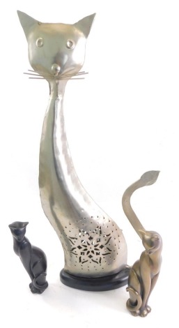 A modern hammered metal folk art style figure of a standing cat, with part pierced body, 59cm high, a Shudehill gift ware cat and another similar. (3)