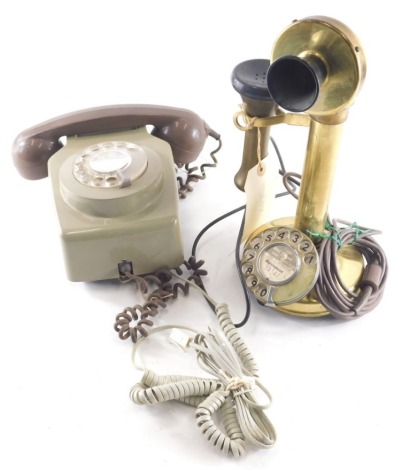 A 1970's Centenary brass stick telephone, 39cm high, and a further telephone in grey converted. (2)