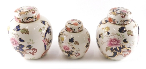 A pair of Mason's ironstone Mandalay pattern ginger jars, and covers, 25cm high and other smaller. (3)