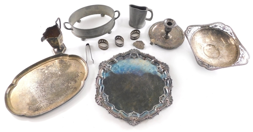 A set of 8 silver plated serviette rings in the form of mice on a wedge