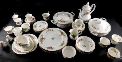 A comprehensive Royal Albert Moss Rose pattern part dinner service, to include pair of lidded tureens, 31cm wide, gravy boat on stand, coffee pot, dinner plates, sugar bowl, serving plate, side plates, etc., printed marks beneath. (a quantity)