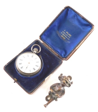 A Victorian silver open faced pocket watch, the 4cm diameter Roman numeric dial with subsidiary Arabic second hand marked AWW Co Waltham Mass in Ballard case, Birmingham 1899 and a small imp door knocker. (2)