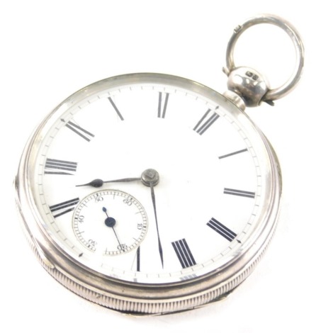 A Victorian silver open faced pocket watch, with 5cm diameter Roman numeric dial with Arabic subsidiary second hand, in an engine turned case, Chester 1877.