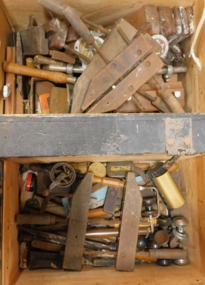 A collection of vintage wood working and other tools, to include wooden block planes, chisels, etc. (2 boxes)