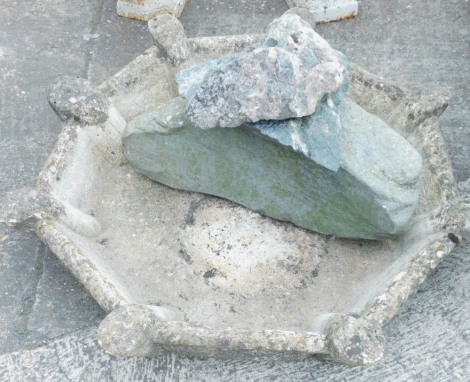 A composition stone water feature., 92cm wide.