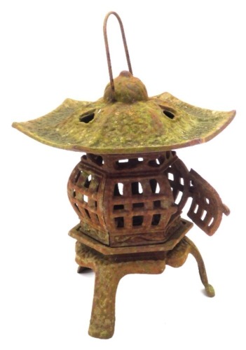 A cast iron oriental style brazier or lantern, 34cm high.