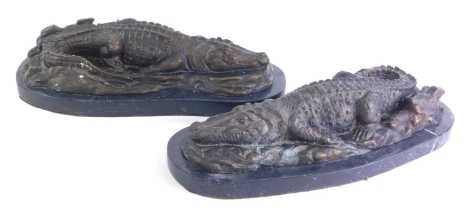 20thC School. Crocodiles, bronze, a pair, each on marble base, 35cm wide.