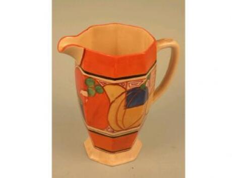 A Clarice Cliff "Fantasque" octagonal jug painted with the Melon pattern in orange