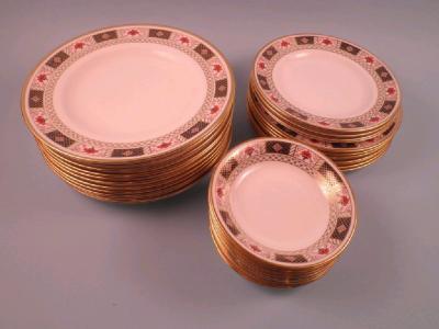 A Royal Crown Derby Derby Border pattern dinner service to include dinner plates