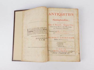 Thoroton (Robert) THE ANTIQUITIES OF NOTTINGHAMSHIRE... title in red and black, imprimatur leaf, woodcut vignettes throughout, folding engraved plates, including rare armorial addendum, folio, later calf, tooled in blind, morocco spine labels, R. White fo - 2