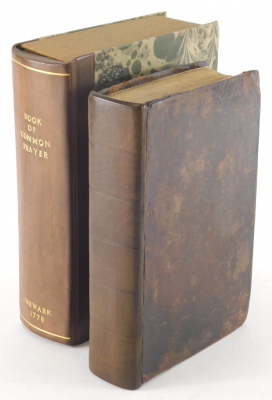 Book of Common Prayer.- Provincial Printing.- Lewis (W. Rev.) THE BOOK OF COMMON PRAYER... contemporary ink ownership signature of Thomas Mead Derby, wood-engraved vignettes throughout, contemporary calf, rebacked, 8vo, preserved in later box, 1778 *** T