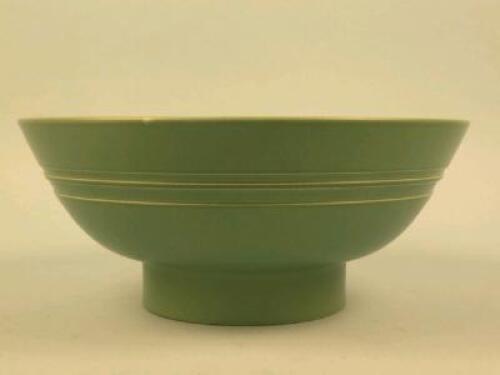 A Wedgwood Keith Murray matt green all glazed bowl with a double band