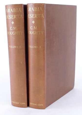 Doughty (C.M.) ARABIA DESERTA, with an introduction by T.E. Laurence, published by Jonathan Cape, London 1936 in two volumes, bound in brown cloth with gilt.