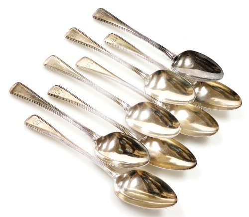 A harlequin set of eight Georgian silver Old English pattern table spoons, each handle with engraved initials, London 1757, 1804 and 1811, 15¾oz.
