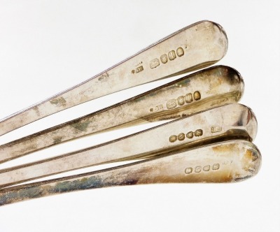A harlequin set of eight Georgian silver Old English pattern table spoons, each handle with engraved initials, London 1757, 1804 and 1811, 15¾oz. - 2