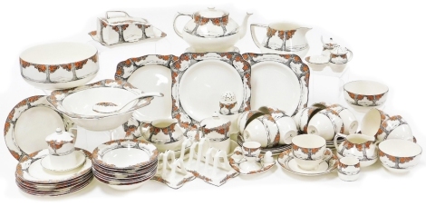 A Crown Ducal Orange Tree pattern part tea and dinner service, comprising teapot and stand, eleven tea cups, eleven saucers, two milk jugs, two sugar bowls differing sizes, two condiment pot and cover, eight cake plates, four division toast rack, two divi