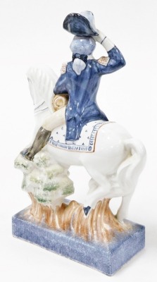 A Rye pottery figure of a gentleman on horseback, in military dress, 32cm high. - 2