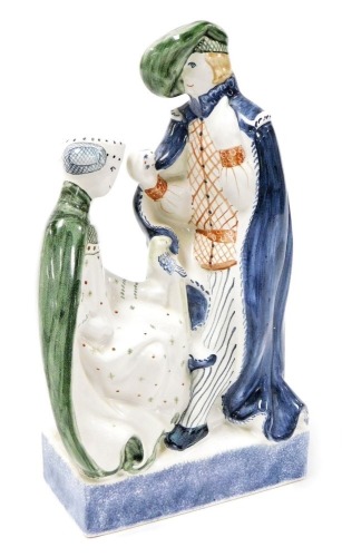 A Rye pottery figure group, of a lady and gentleman courting, in historical costume, 27cm high.