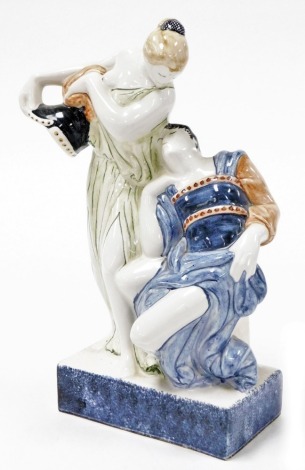 A Rye pottery figure group, of two lovers in classical dress, 24cm high.