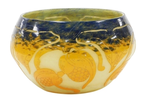 A cameo glass bowl, decorated in purple and orange overlay with stylised fruit and leaves, bears etched mark for La Verre Francais, 18cm wide.