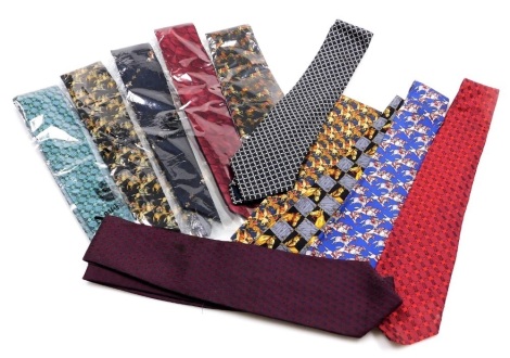 Eleven Aquascutum silk ties, of varying designs and colours, to include horses, horse and jockey, hatched examples, etc.