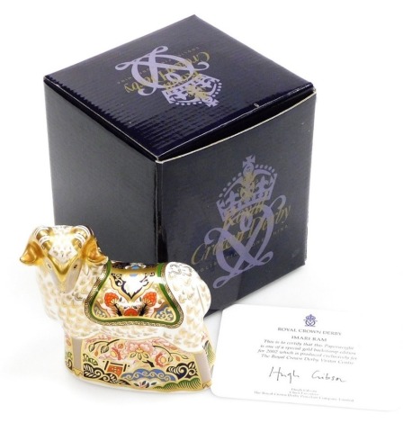 A Royal Crown Derby porcelain Imari Ram paperweight, exclusively produced for the Royal Crown Derby Visitor's Centre, gold stopper and gold printed marks, 10cm high, boxed with certificate.