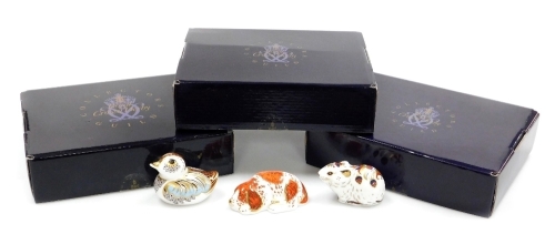 A group of Royal Crown Derby porcelain paperweights, comprising Collector's Guild Duckling, gold stopper, 8cm wide, puppy, an exclusive for The Royal Crown Derby Collectors Guild, gold stopper, 9cm wide, and Bank Vole, produced exclusively for The Royal C