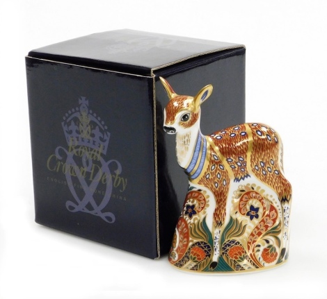A Royal Crown Derby porcelain Fawn paperweight, produced exclusively for The Royal Crown Derby Collectors Guild, gold stopper, 13cm high, boxed.