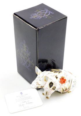 A Royal Crown Derby porcelain Prudence Pig money box, pre-released to Peter Jones of Wakefield, limited edition no. 193/500, gold stopper and red printed marks, 12cm high, boxed with certificate.