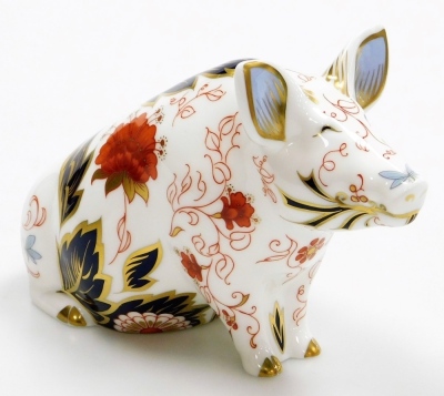 A Royal Crown Derby porcelain Prudence Pig money box, pre-released to Peter Jones of Wakefield, limited edition no. 193/500, gold stopper and red printed marks, 12cm high, boxed with certificate. - 2