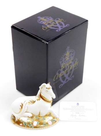 A Royal Crown Derby porcelain Mythical Unicorn paperweight, the second of a pair of Mythical Beasts exclusive for Goviers of Sidmouth, designed by June Branscombe, limited edition 728/1750, gold stopper and red printed marks, 14cm high, boxed with certifi