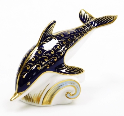 A Royal Crown Derby porcelain Dolphin paperweight, gold stopper and red printed marks, 17cm wide, boxed. - 2