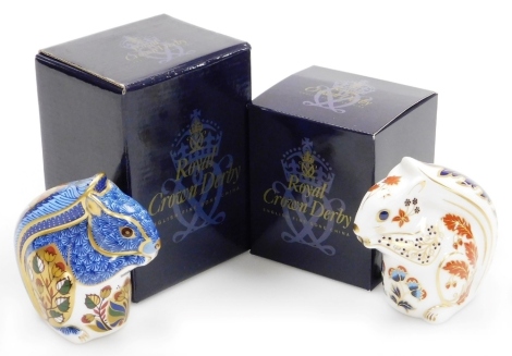 Two Royal Crown Derby paperweights, comprising Debenhams Squirrel and Grey Squirrel, both with gold stoppers, each 8cm high, both boxed.